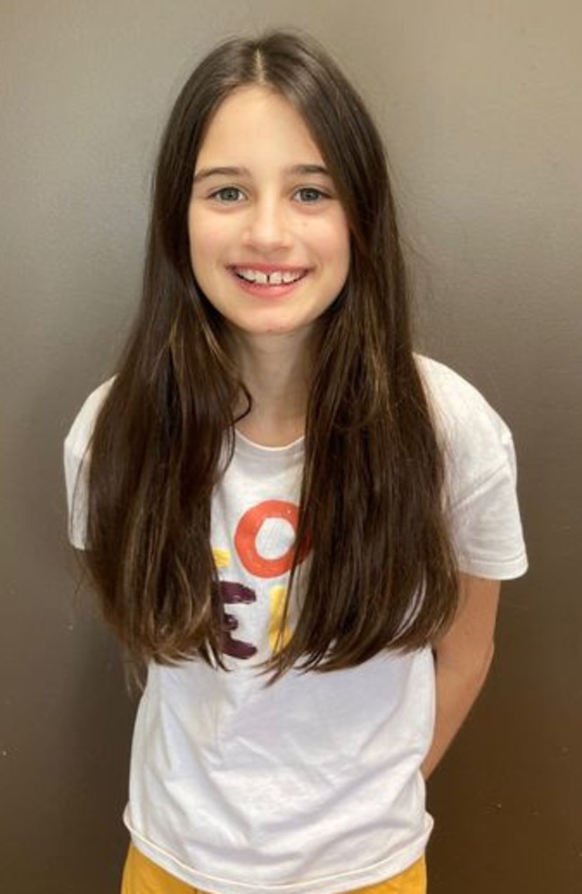 Samantha 'Sammy' Collins, 11, of Narraweena, before she had her hair radically shortened to raise more than $5300 for the Bear Cottage children's hospice at Manly in memory of her best friend Neve Brady. Picture: Supplied