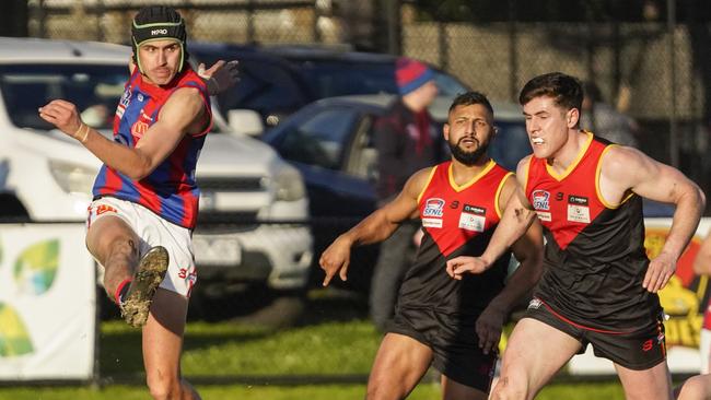 SFNL: Springvale Districts’ Ryan MacDermid gets a kick away. Picture: Valeriu Campan