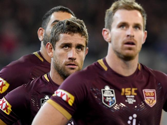 The Maroons look up at the score board after the Blues score a try during Game 1 of the 2018 State of Origin series at the MCG in Melbourne, Wednesday, June 6, 2018. (AAP Image/Joe Castro) NO ARCHIVING, EDITORIAL USE ONLY