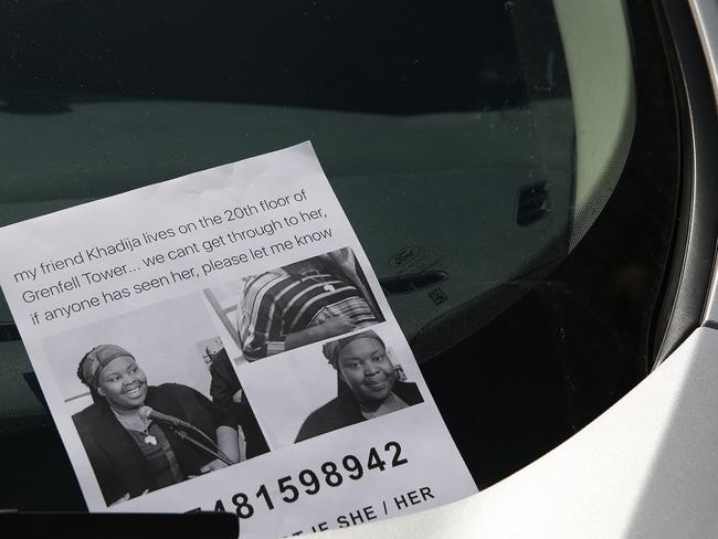 A flyer for a missing person Khadija Saye, is seen on a car near a temporary casualty bureau opened for people affected by the fire at Grenfell Tower. Picture: PHOTO / DANIEL LEAL-OLIVAS