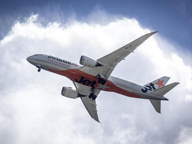 BRISBANE AUSTRALIA - NewsWire Photos SEPTEMBER 6, 2022: A Jetstar plane leaves Brisbane Airport. Hundreds of Australians are stranded in Bali after multiple Jetstar flight cancellations leave travellers scrambling to find emergency accommodation. NewsWire / Sarah Marshall