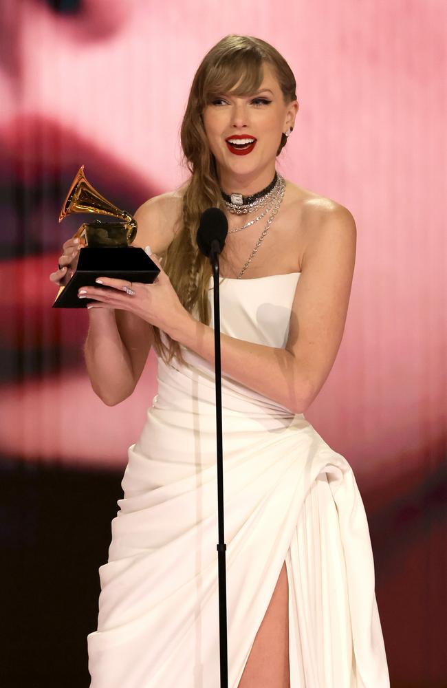 Taylor Swift makes history after being the first artist to win four Album of the Year Grammys. Picture: Getty Images