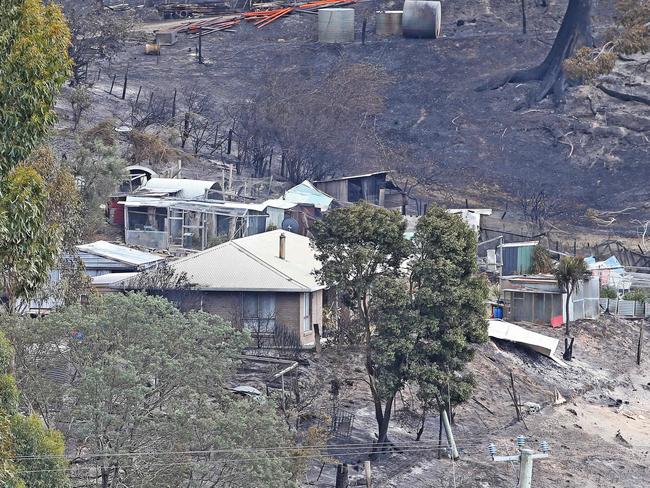 Damaged properties at Pelham. Picture: ZAK SIMMONDS