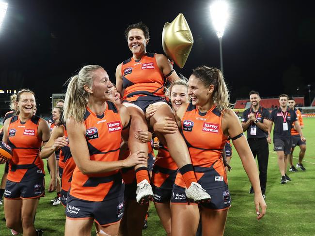 CANBERRA, AUSTRALIA - MARCH 15: Courtney Gum of the Giants is chaired from the field after playing her last AFLW match during the AFL round seven match between the Greater Western Sydney Giants and the Geelong Cats at on March 15, 2019 in Canberra, Australia. (Photo by Matt King/Getty Images)