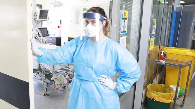 Personal protective equipment was heavy and sweltering, but ICU nurses like Ms Davis wear it to ensure they don’t contract and then pass on COVID-19. Picture: AAP Image/Claudia Baxter