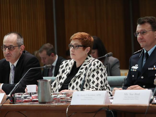 Secretary of the Department of Home Affairs Michael Pezzullo, Foreign Affairs Minister Marise Payne and AFP Commissioner Reece Kershaw appearing at a Senate Estimates hearing on Legal and Constitutional Affairs at Parliament House in Canberra. Picture Kym Smith