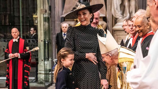 The Duchess of Cambridge introduces Princess Charlotte to the Archbishop of Canterbury Justin Welby. Picture: AFP.