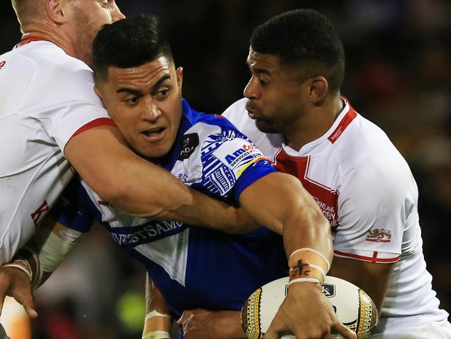 Samoa’s Tim LaFai looks to offload. pic Mark Evans