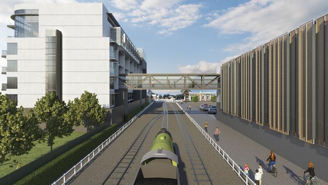 Under plans for a hotel complex next to the Anchorage Hotel, a footbridge would be built between the hotel and a carpark, overlooking the Steamranger train track. Picture: Supplied