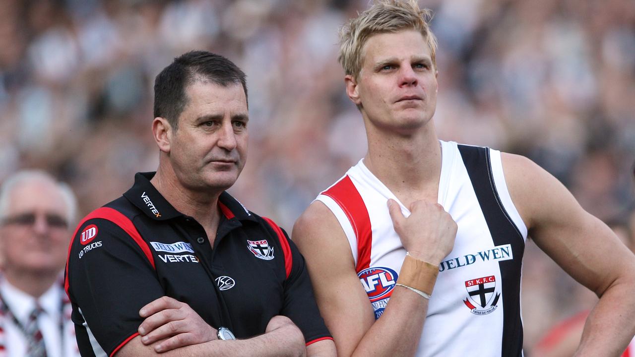 2010 Grand Final REPLAY. St Kilda v Collingwood. MCG. St Kilda coach Ross Lyon and captain Nick Riewoldt watch Collingwood receive the cup.