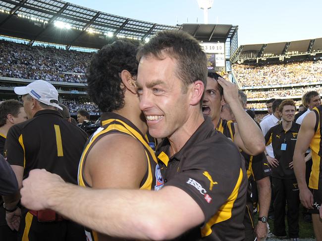 Clarkson embraces Cyril Rioli after Hawthorn’s win in the 2008 Grand Final.