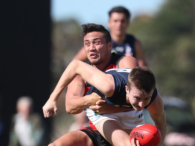 Thor Boscott of Lauderdale and Tyson Miller of Launceston in Saturday’s Lauderdale V Launceston Tasmanian State League match. Picture: NIKKI DAVIS-JONES