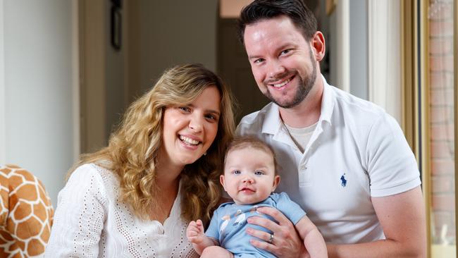 Rachael Leahcar and husband Chris Johinke with baby Eli. Picture Matt Turner.