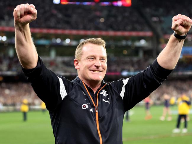 MELBOURNE, AUSTRALIA - SEPTEMBER 15: Blues coach Michael Voss celebrates after the Blues defeated the Demons during the AFL First Semi Final match between Melbourne Demons and Carlton Blues at Melbourne Cricket Ground, on September 15, 2023, in Melbourne, Australia. (Photo by Robert Cianflone/Getty Images)