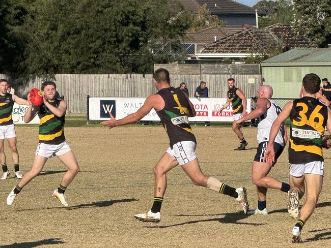 Bryce Hornsby with the ball for Dromana. Picture: Simon McEvoy