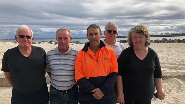 From left vice president Ron Saville, John Rennie, sailing director Steve Burley, president Barry Wallace and treasurer Lynne Wallace.