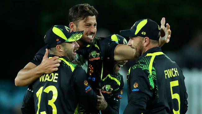 Marcus Stoinis celebrates one of his three wickets.