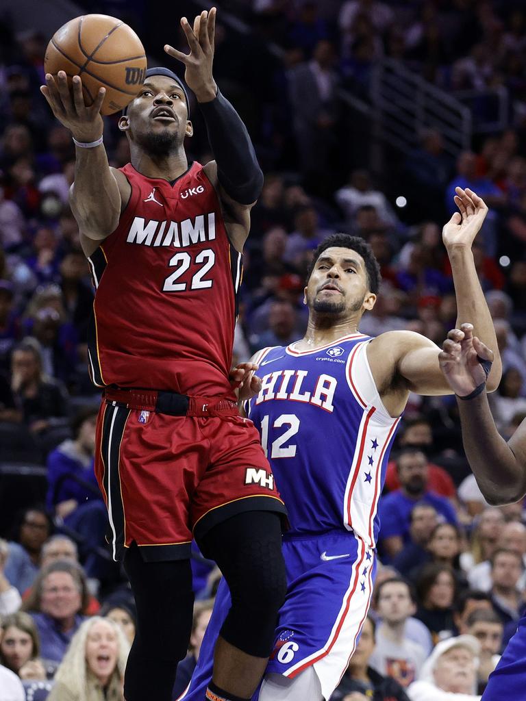 Jimmy Butler scores on Tobias Harris. Photo: Tim Nwachukwu/Getty Images/AFP.