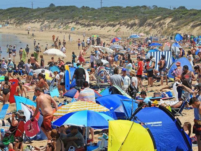 Holiday makers at Ocean Grove surf beach. Picture: Mark Stewart