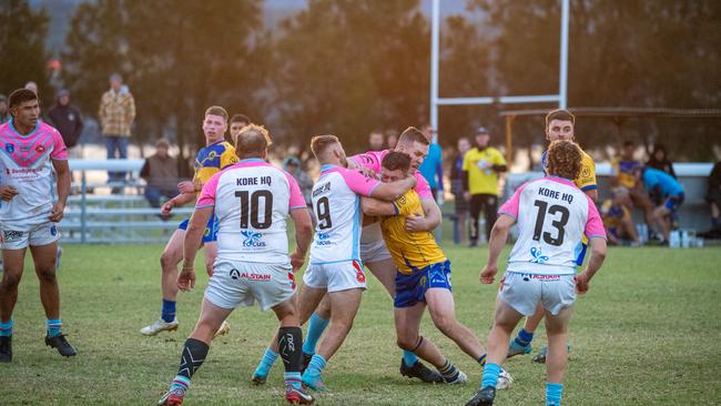 Warilla-Lake South Vs Milton-Ulladulla. Jamie Burns in a tough battle. Picture: Thomas Lisson