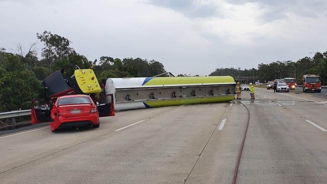 Police have declared an emergency situation following a fuel tanker rollover on the M1 at Helensvale.