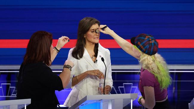 Nikki Haley receives a touchup during a break in the Republican debate. Picture: AFP