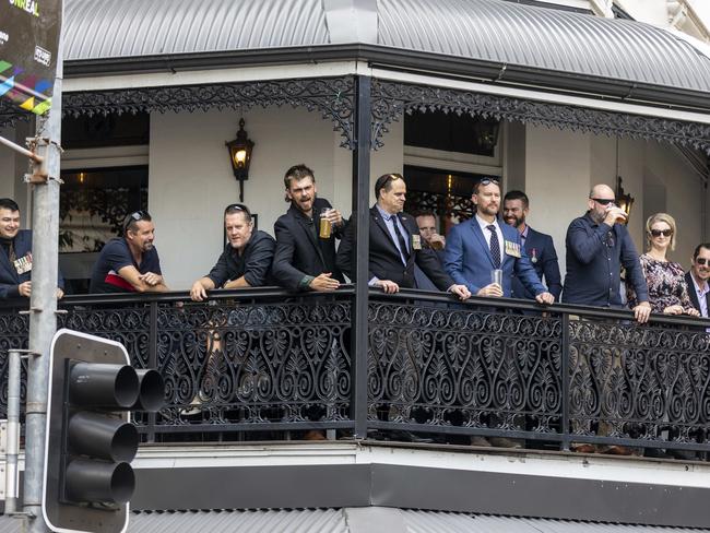 People cheered from the streets and from the top of pubs as veterans and servicing members of the Defence Force marched during the ANZAC Day parade through Brisbane city. Picture: NCA NewsWire / Matthew Poon