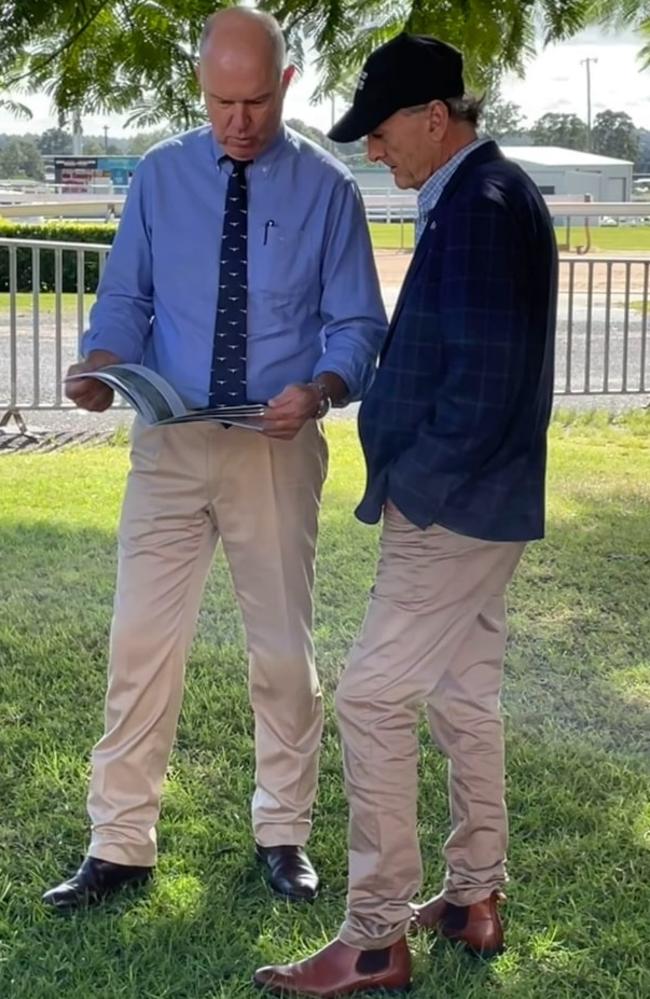 Primary Industries Minister Tony Perrett peruses the 25-year blueprint for boosting Queensland's primary industry sector at a public consultation in Gympie on Friday.