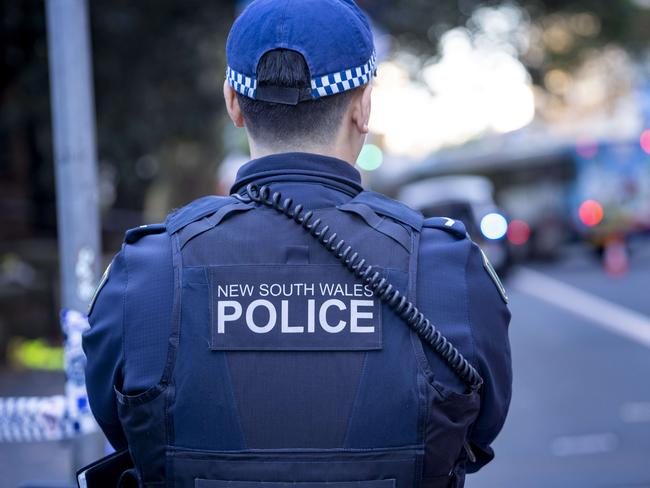 Police on the scene in Sydney's CBD this afternoon after a police officer was stabbed twice in the head by a knife-wielding man. The alleged offender was tasered and arrested at gunpoint following the attack, which took place shortly after 1pm on Sunday. Photo: Tom Parrish