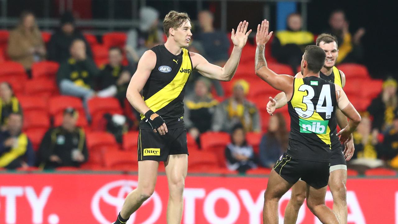 Tom Lynch kicking a goal for the Tigers at his former home ground, Metricon Stadium. Picture: Getty Images