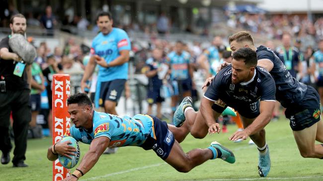 Greg Leleisiuao scoring in a game of nines earlier this year. (AAP Image/Richard Wainwright)