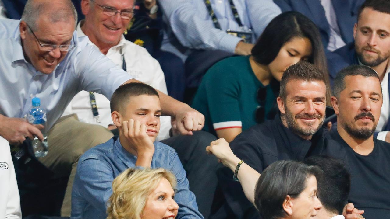 Romeo Beckham seems unimpressed by the prime minister’s fist pumping skills. Picture: Chris Jackson/Getty Images for the Invictus Games Foundation.