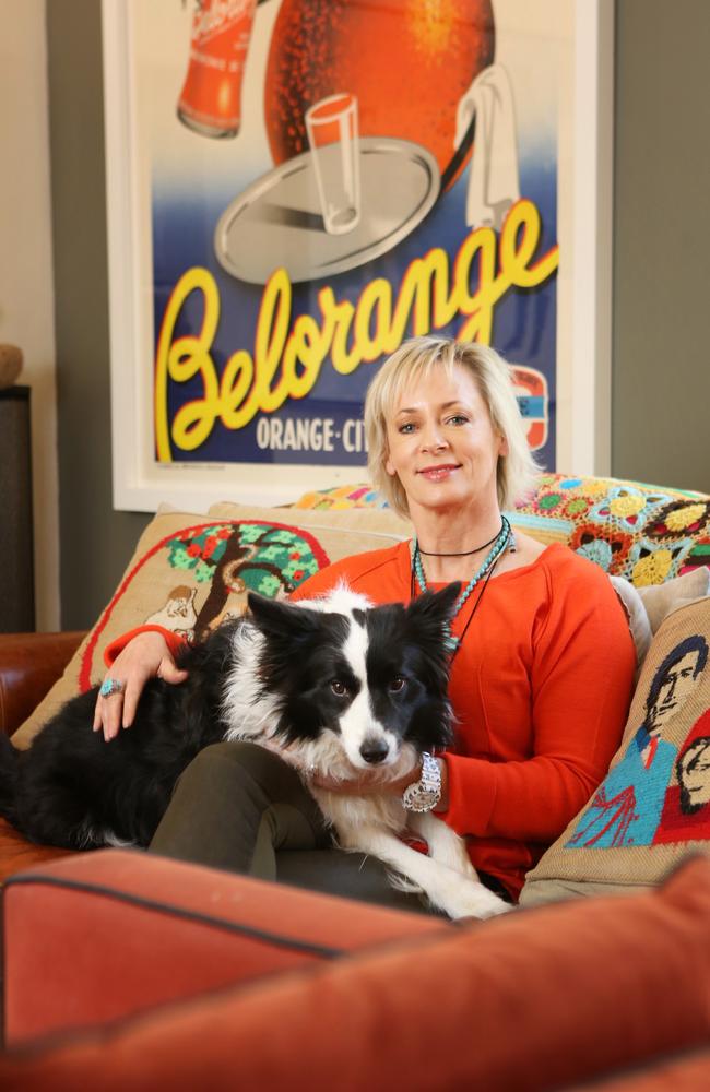 At home ... Amanda Keller in her Sydney home with her sheep dog Minnie. Picture: Bob Barker.