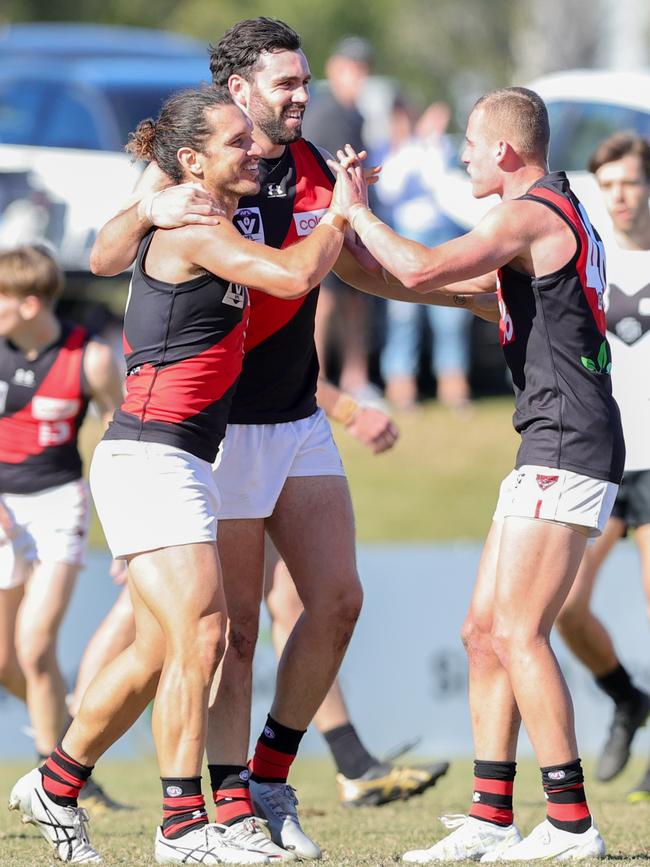 Territory legend Cameron Ilett celebrates a goal for the Bombers against Southport Sharks at Fankhauser Reserve on July 25. Picture: Russell Freeman/AFL Photos via Getty Images