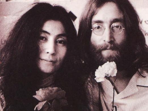 AUS50TH 1969: Former Beatle John Lennon with wife Yoko Ono in bed in Montreal in 1969. Picture: Supplied