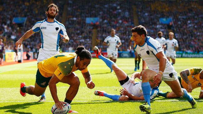 Joe Tomane scoring against Uruguay the last time the two countries met. Picture: Laurence Griffiths/Getty Images