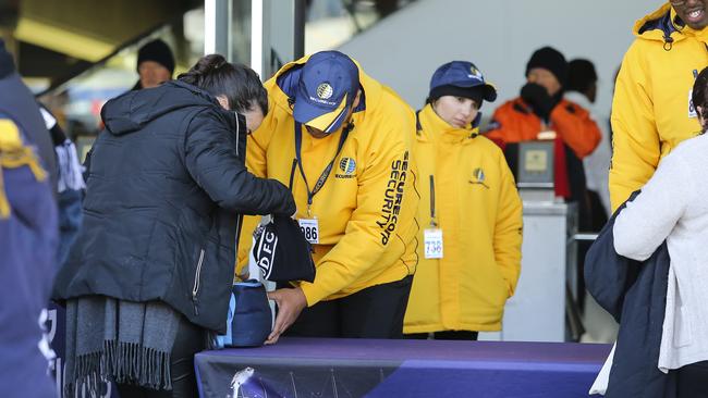 Bag checks are among the existing security measures. Picture: Martin Keep