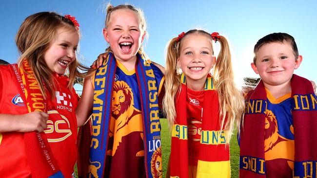 AFL fans Matilda Mooney 5, Amelia Shelton 7, Bronte Mooney 7 and Harley Shelton 5 will get plenty of footy to watch with all the Melbourne clubs in Qld as well as having their own clubs the Suns and Lions at home all the time. Pics Adam Head