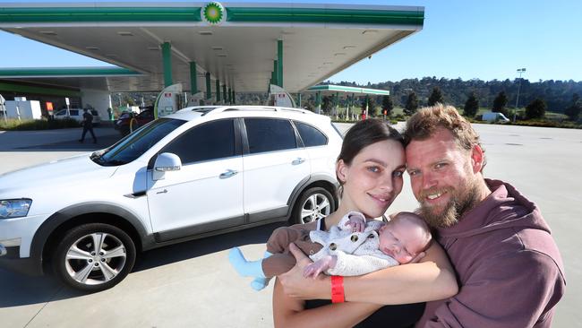 Tiarna Van Brakel with her partner Adam and their 6 days old baby boy Falcon at the BP in Baxter. Picture Rebecca Michael