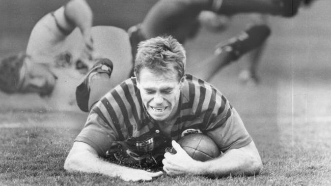 Greg Florimo scores a try for the Bears.