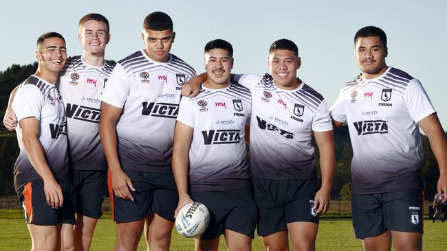 Boom rookies: Captain Kit Laulilii (2nd right) with members of the Wests Magpies’ 2022 Harold Matts premiership winning side, (L-R) Tallyn Da Silva, Lachlan Galvin, Jordan Miller, Jeremiah Leatigaga, Kit Laulilii and James Folaumoetui. Picture: Richard Dobson