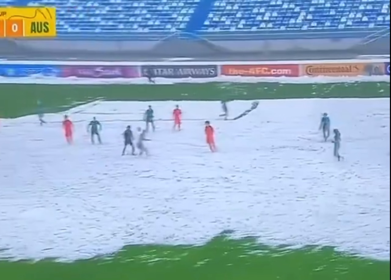 Young Matildas play on a snow-covered pitch in Uzbekistan