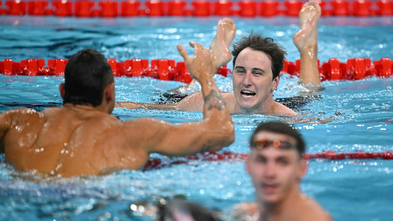 McEvoy celebrated with bronze medallist France's Florent Manaudou after his win in the final of the men's 50m freestyle. Picture: Oli Scarff/AFP