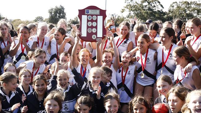 Melbourne Girls Grammar celebrate winning the senior girls title. Picture: Daniel Pockett/AFL Photos/via Getty Images