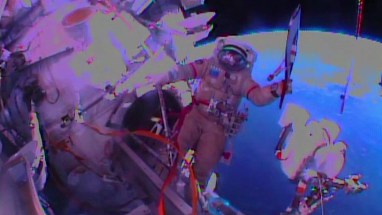 In this image obtained from NASA TV, Cosmonaut Oleg Kotov holds the Sochi 2014 Winter Olympic Games Torch during a spacewalk outside the International Space Station on November 9, 2013. The torch also visited the ISS ahead of the 1996 Summer Games in Atlanta and the 2000 games Sydney, but this is the first time it has been along for a spacewalk. = RESTRICTED TO EDITORIAL USE - MANDATORY CREDIT "AFP PHOTO / NASA TV" - NO MARKETING NO ADVERTISING CAMPAIGNS - DISTRIBUTED AS A SERVICE TO CLIENTS   NO ARCHIVE =