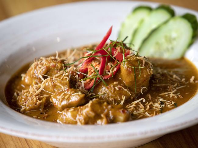 Bite Me’s signature curry, which features large chunks of chicken in a creamy, coconutty sauce. Picture: Chris Kidd