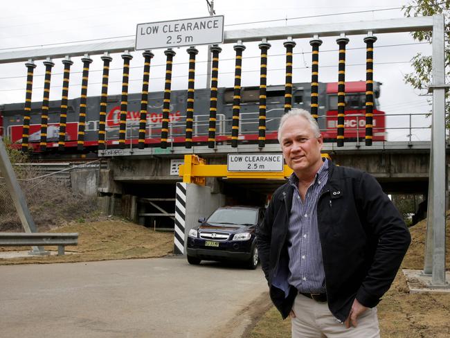 Peninsula Chamber president Matthew Wales at the existing Woy Woy underpass which was recently closed for months after being hit by a truck. Mr Wales claims the peninsula has been sold a “dead duck”.