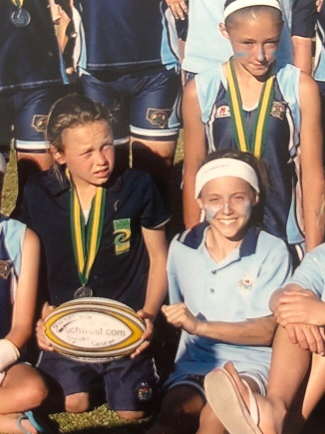 Hayley Raso (in white headband) as an 11-year-old next to fellow Matildas player Caitlin Foord (holding football) during their days playing touch football for NSW.