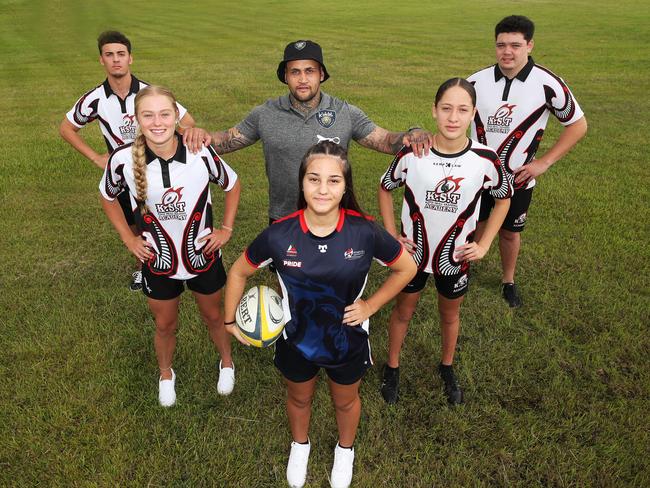 Former Wallaby Richard Kingi has launched a breakaway junior rugby union club but the governing body on the Gold Coast are yet to give it the green light. Team members (from front) Ayla Alic, 14, Sian McNeill, 16, Richard Kingi, Jyahti Kingi, 14, Tai Gordon, 17, and Tana Heron 17. Picture: Glenn Hampson