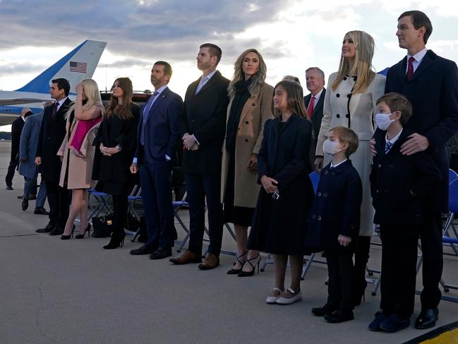 Ivanka Trump (2nd R), Jared Kushner (R), their children, Eric (C-R) and Donald Jr. (C-R) and Trump family members stand on the tarmac at Joint Base Andrews in Maryland. Picture: AFP